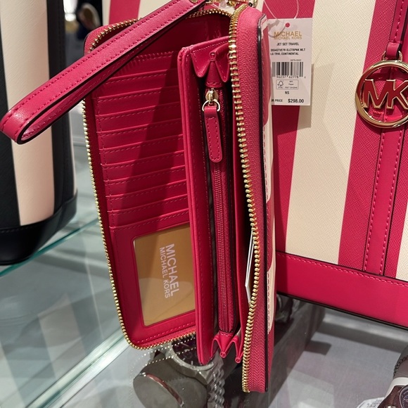 MICHAEL KORS JST 
Leather Continental Wristlet Phone Case Wallet 
El Pink 
NWT - Picture 9 of 16